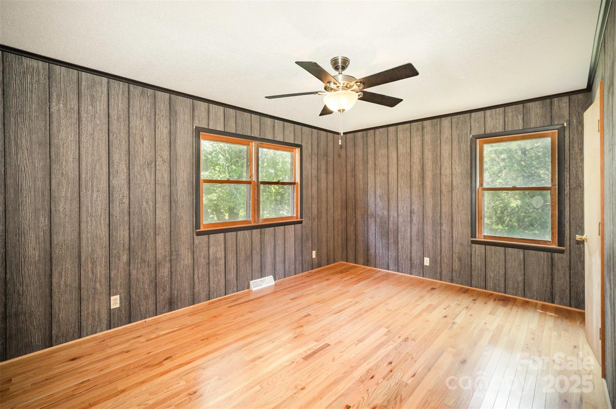 5474 Ussery Road Kershaw, SC 29067 - Photo 17 of 33 a bedroom with a large bed and a window