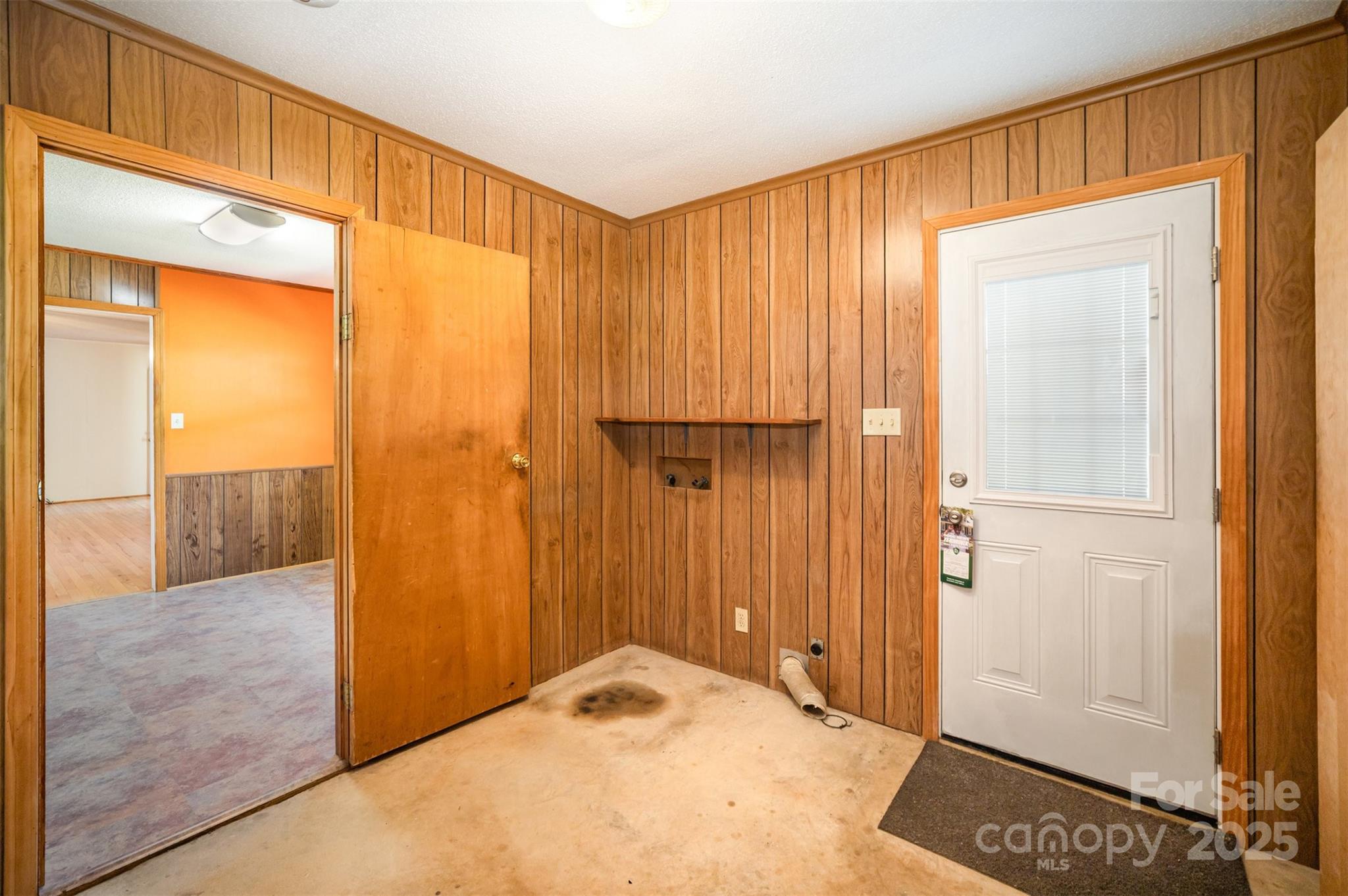 5474 Ussery Road Kershaw, SC 29067 - Photo 20 of 33 a view of a bathroom with a wooden door