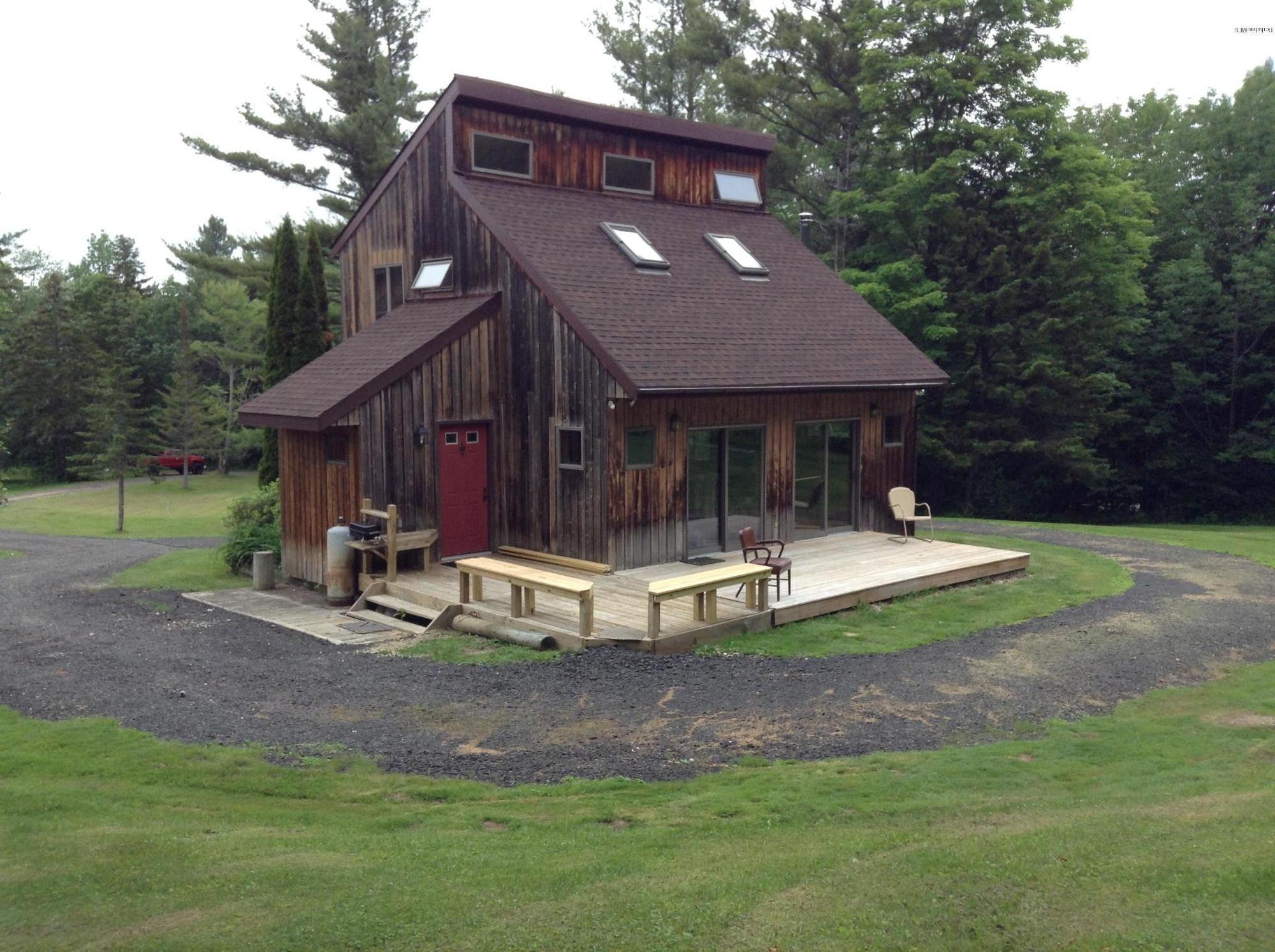 604 East Windsor Road Windsor, MA 01270 - Photo 2 of 28 a view of a house with backyard porch and sitting area