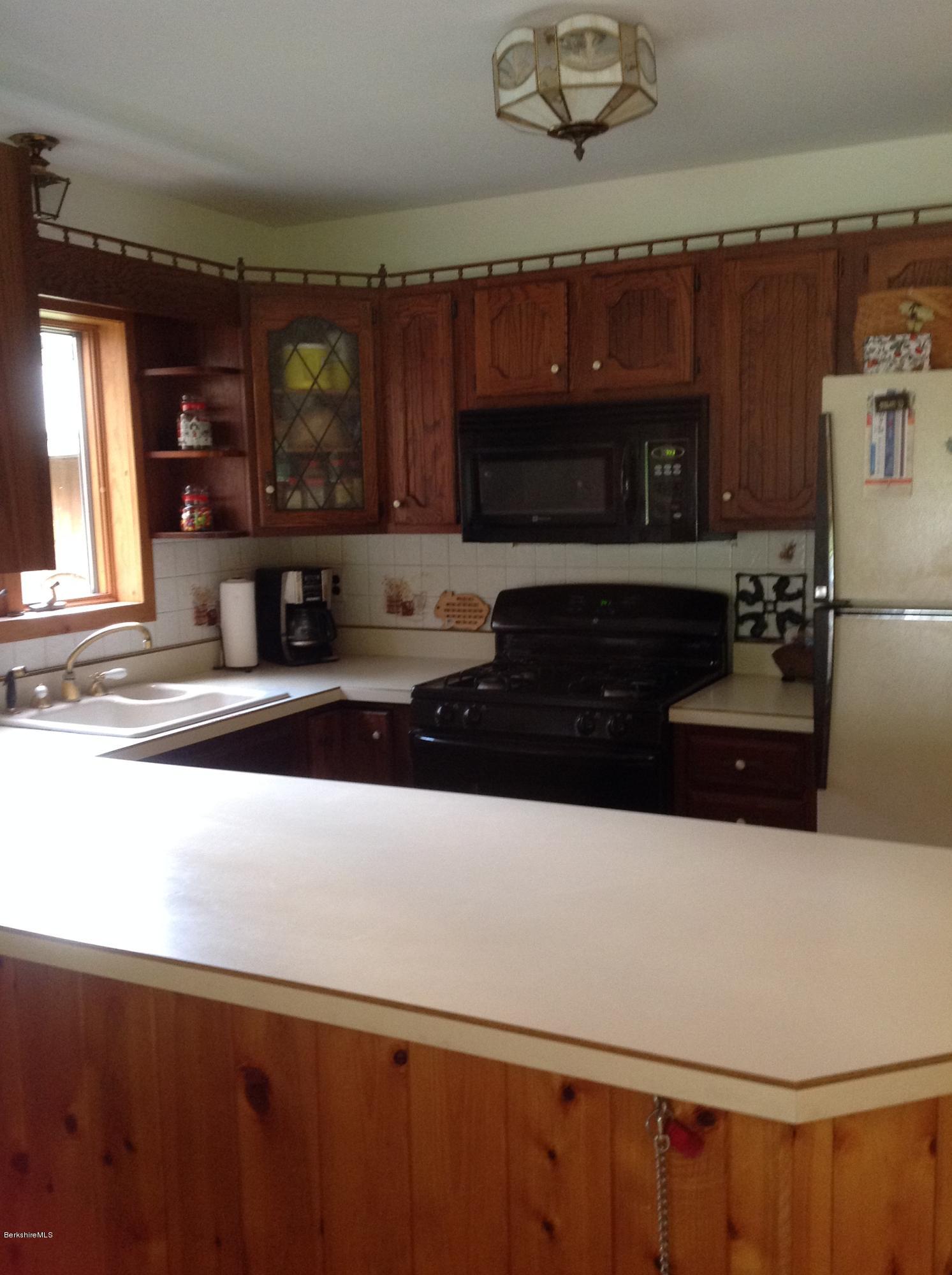 604 East Windsor Road Windsor, MA 01270 - Photo 12 of 28 a kitchen with a sink and a stove top oven