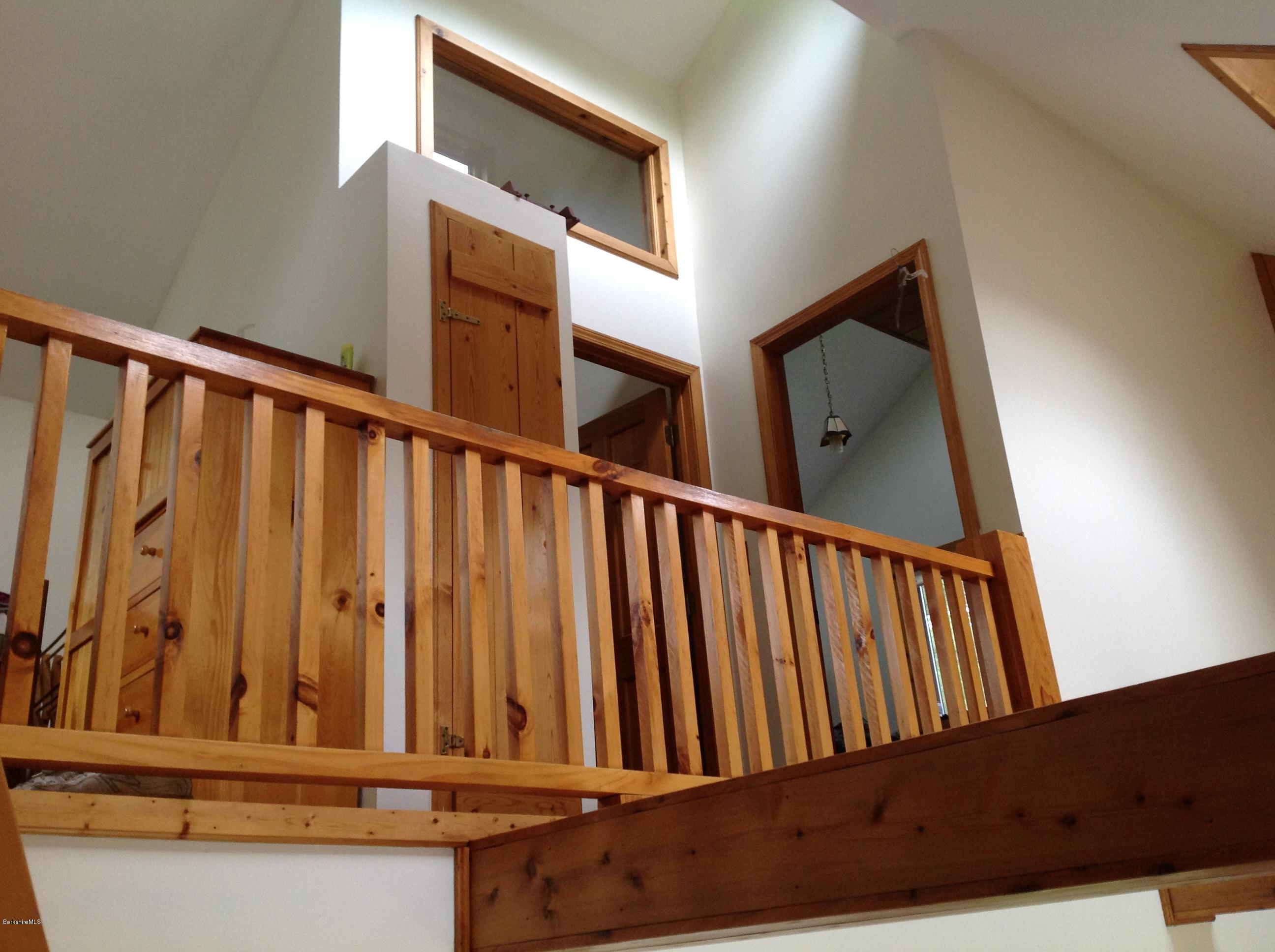 604 East Windsor Road Windsor, MA 01270 - Photo 13 of 28 a view of staircase with railing and a window