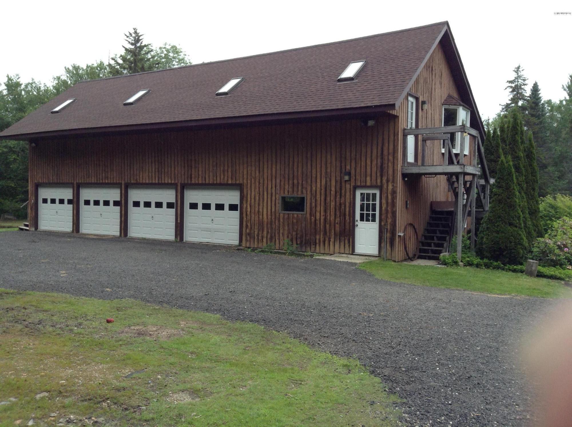 604 East Windsor Road Windsor, MA 01270 - Photo 21 of 28 a front view of a house with a yard