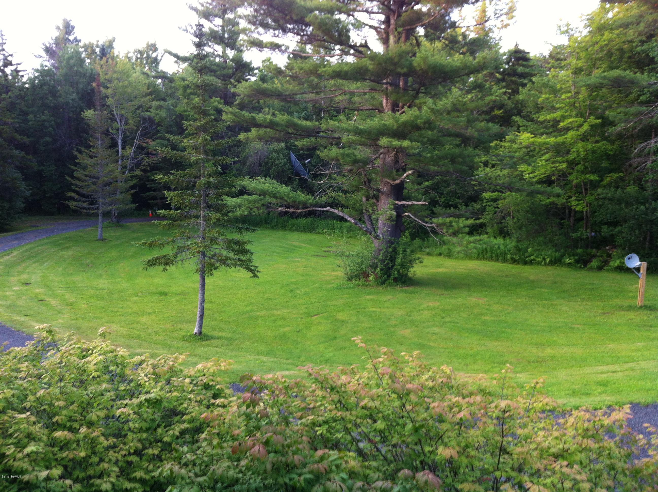 604 East Windsor Road Windsor, MA 01270 - Photo 5 of 28 a backyard of a house with lots of green space