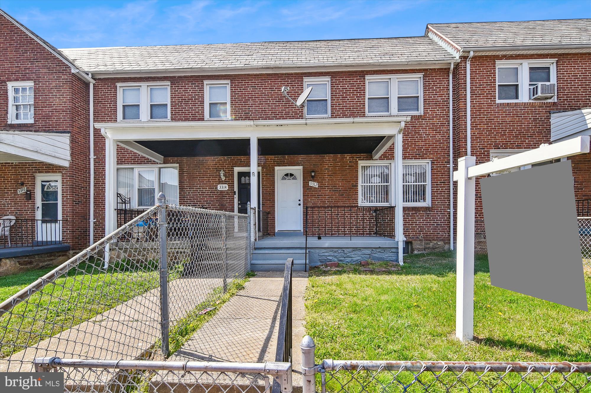 3312 Royce Avenue Baltimore, MD 21215 - Photo 1 of 20 a front view of house with a garden