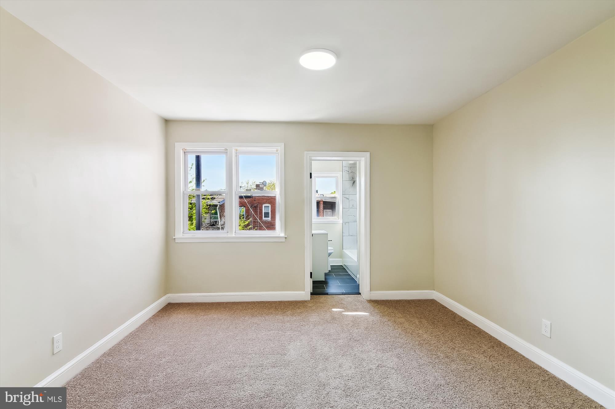 3312 Royce Avenue Baltimore, MD 21215 - Photo 14 of 20 an empty room with windows