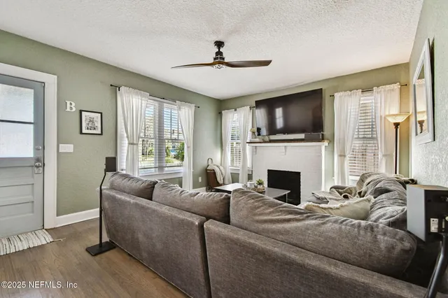 a bathroom with a sink a vanity and a large mirror