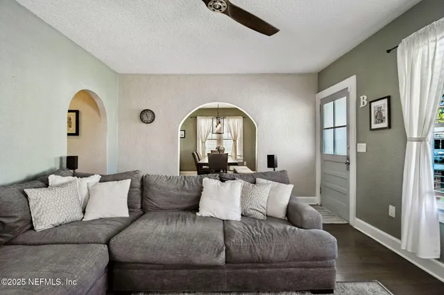 a very nice looking dining room with a dining table and chairs