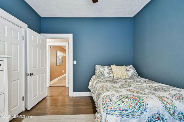 a bathroom with a shower and toilet