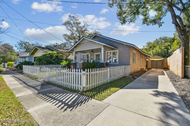 a view of a deck with a fence