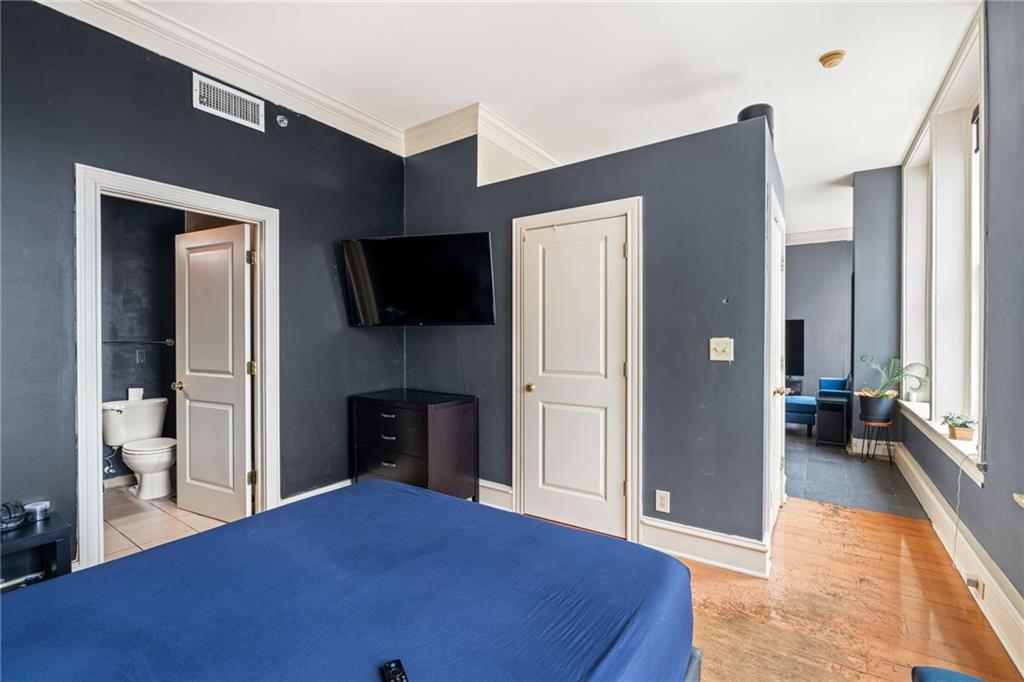 57 Forsyth Street Northwest, Unit 14H Atlanta, GA 30303 - Photo 14 of 42 a view of a livingroom with a flat screen tv