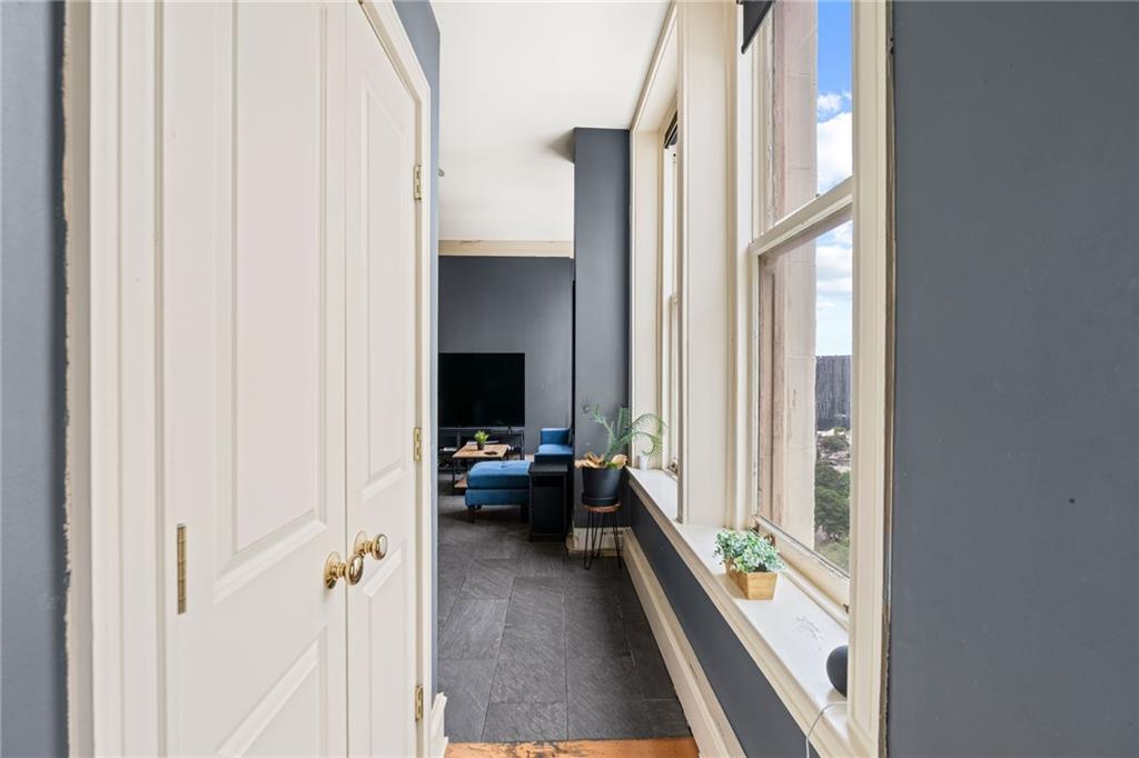 57 Forsyth Street Northwest, Unit 14H Atlanta, GA 30303 - Photo 15 of 42 a view of a living room and a balcony