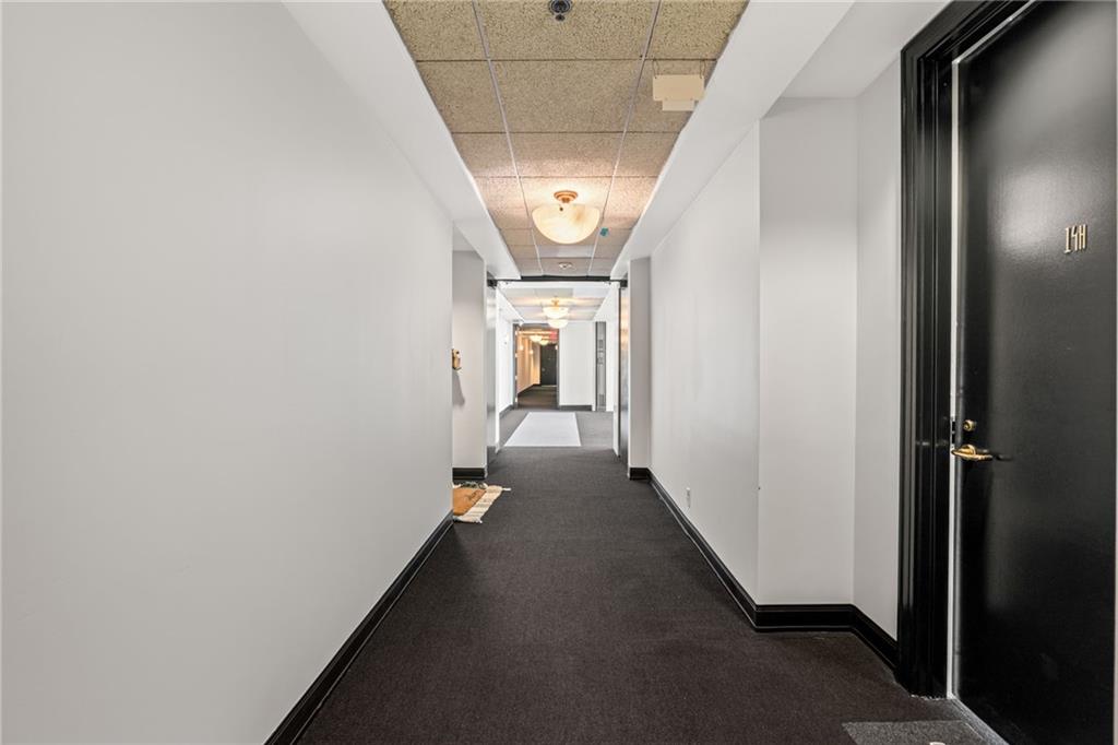 57 Forsyth Street Northwest, Unit 14H Atlanta, GA 30303 - Photo 21 of 42 a view of hallway with stairs