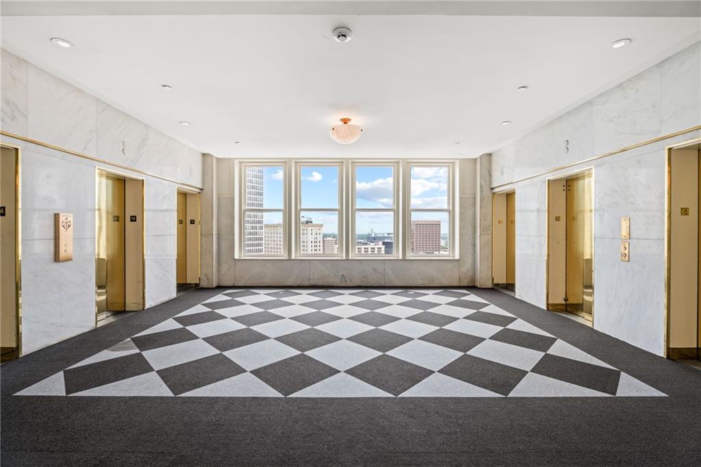 57 Forsyth Street Northwest, Unit 14H Atlanta, GA 30303 - Photo 23 of 42 a view of an empty room with a window