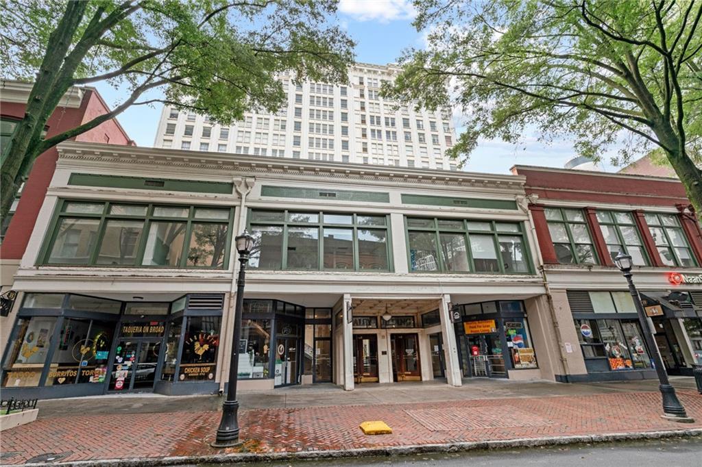 57 Forsyth Street Northwest, Unit 14H Atlanta, GA 30303 - Photo 29 of 42 a front view of a multi story building