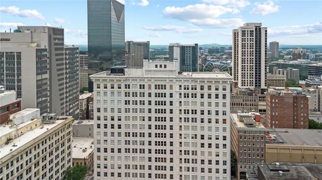 a view of a building with a street