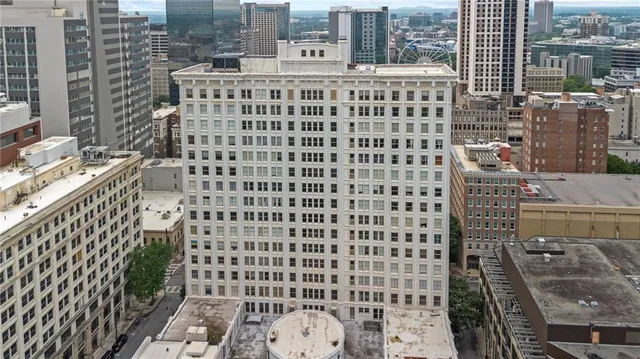 a view of a city with tall buildings