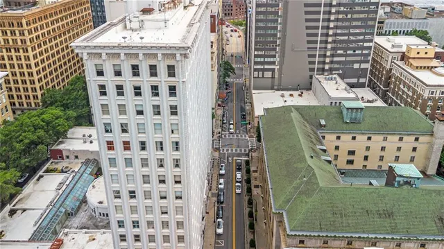 a view of a city with tall buildings