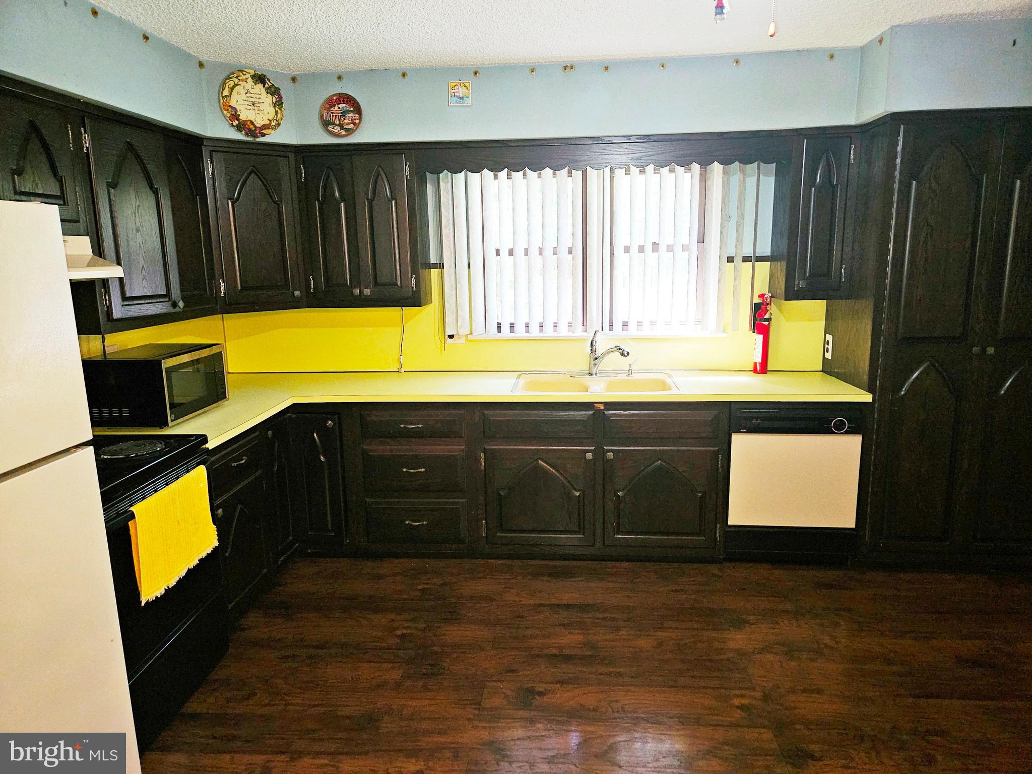 117 Maple Avenue Waterford Works, NJ 08089 - Photo 16 of 67 a kitchen with a sink a stove and a window