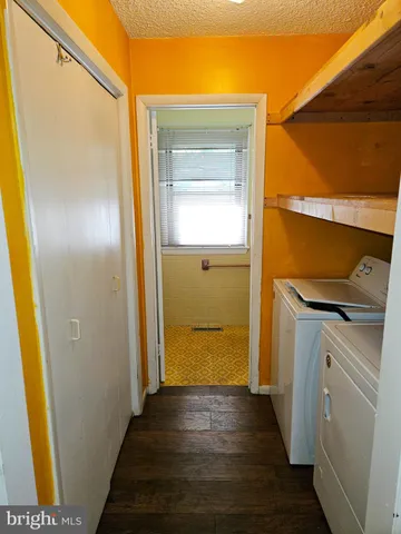 a view of livingroom with hardwood floor and a window
