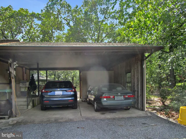 a view of a room with a large window