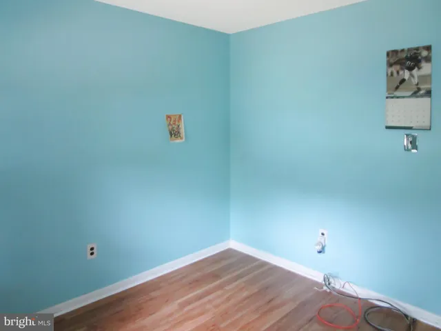 a view of a livingroom with wooden floor