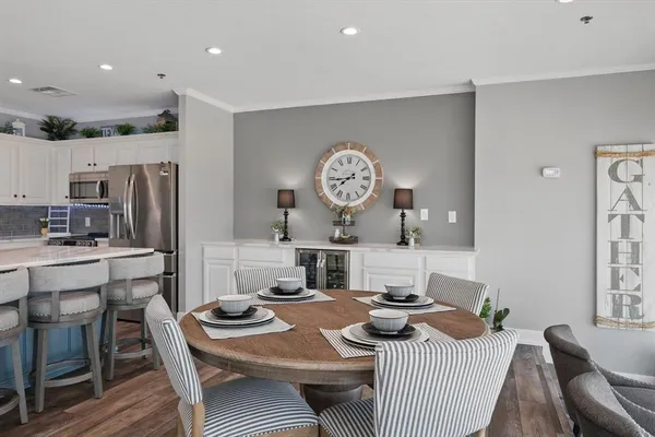 a view of a dining room with furniture