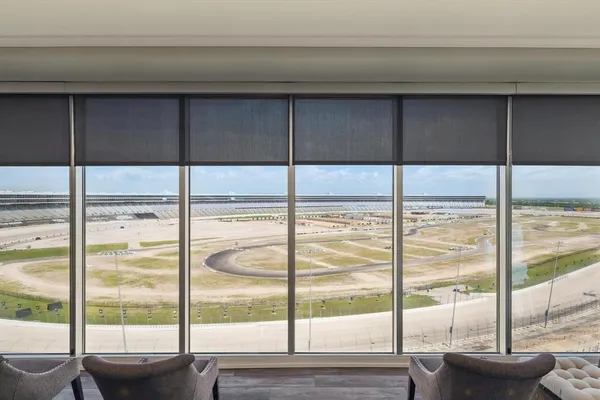 a view of a city from a ceiling window