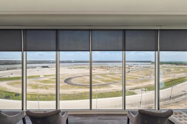 a view of a city from a ceiling window