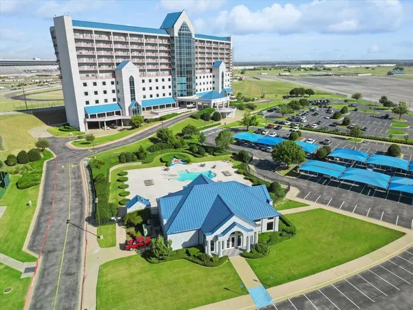 a view of a city with lawn chairs