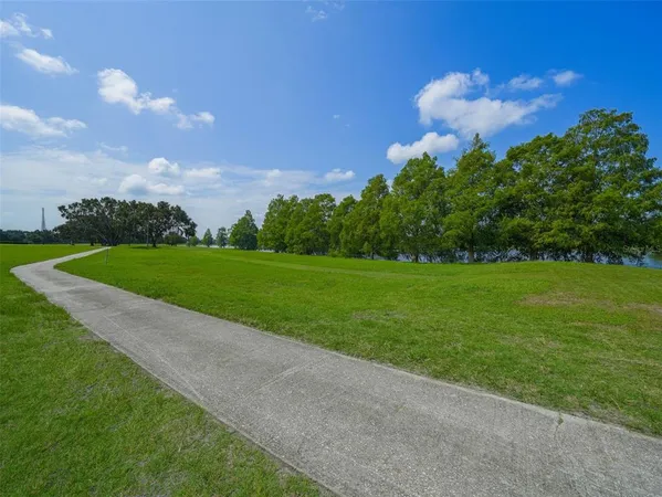 a view of a golf course with a lake