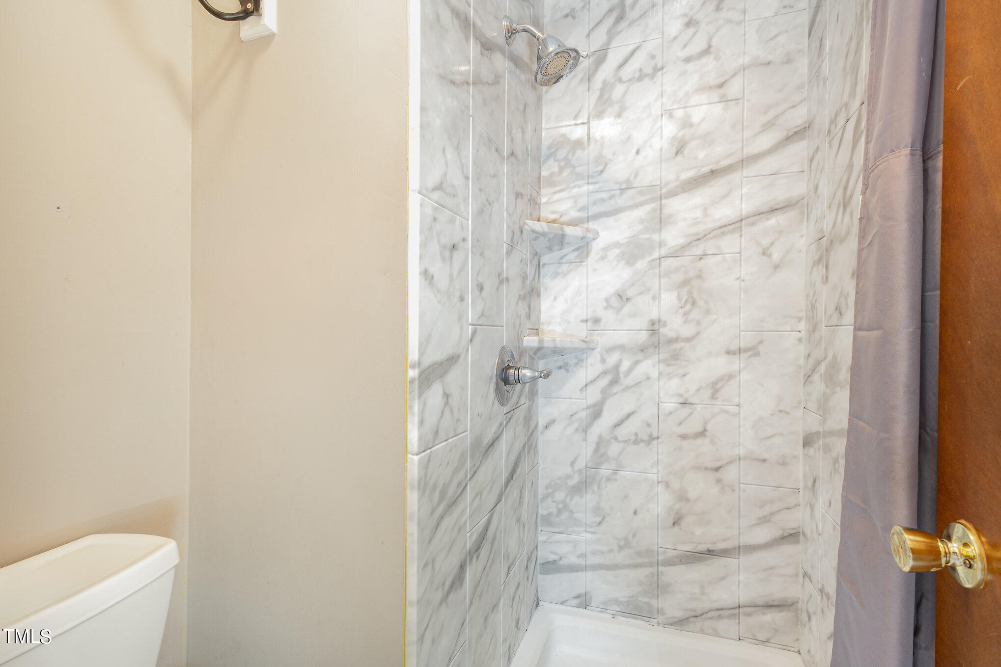 814 Wyldewood Road Durham, NC 27704 - Photo 14 of 26 a bathroom with a shower