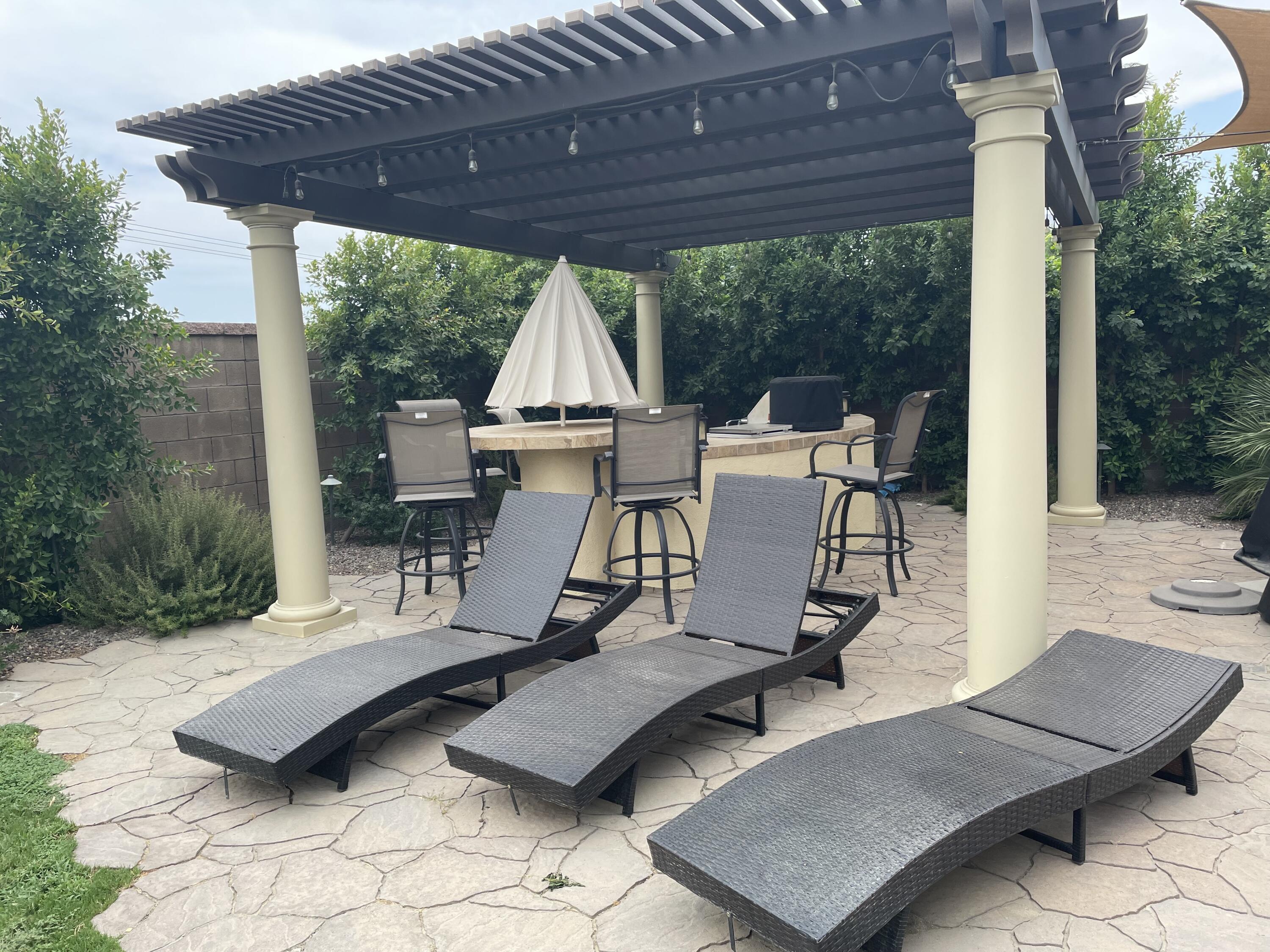 61232 Cactus Spring Drive La Quinta, CA 92253 - Photo 11 of 30 a view of backyard with a patio and a garden