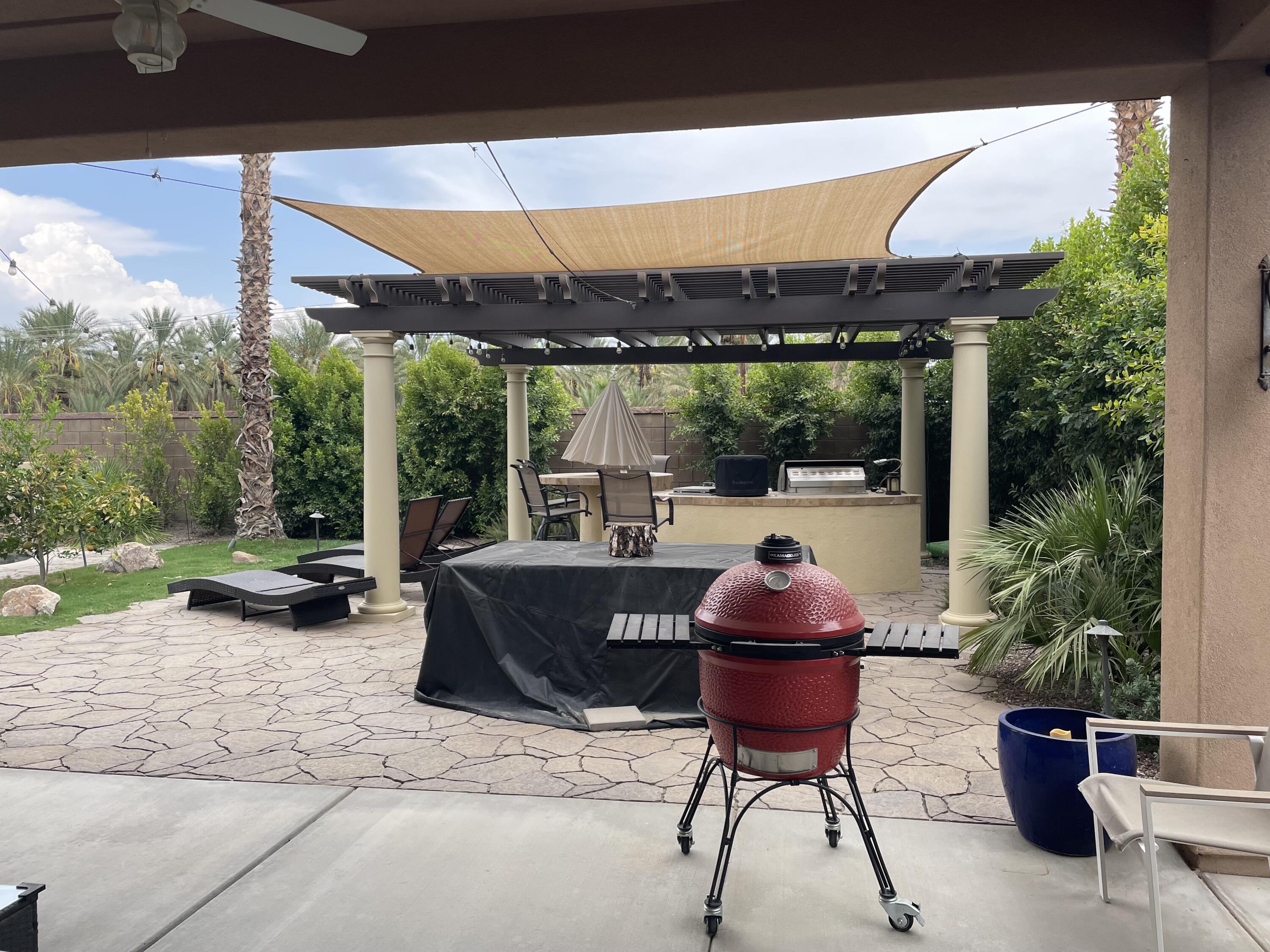 61232 Cactus Spring Drive La Quinta, CA 92253 - Photo 14 of 30 a outdoor view with a sitting space