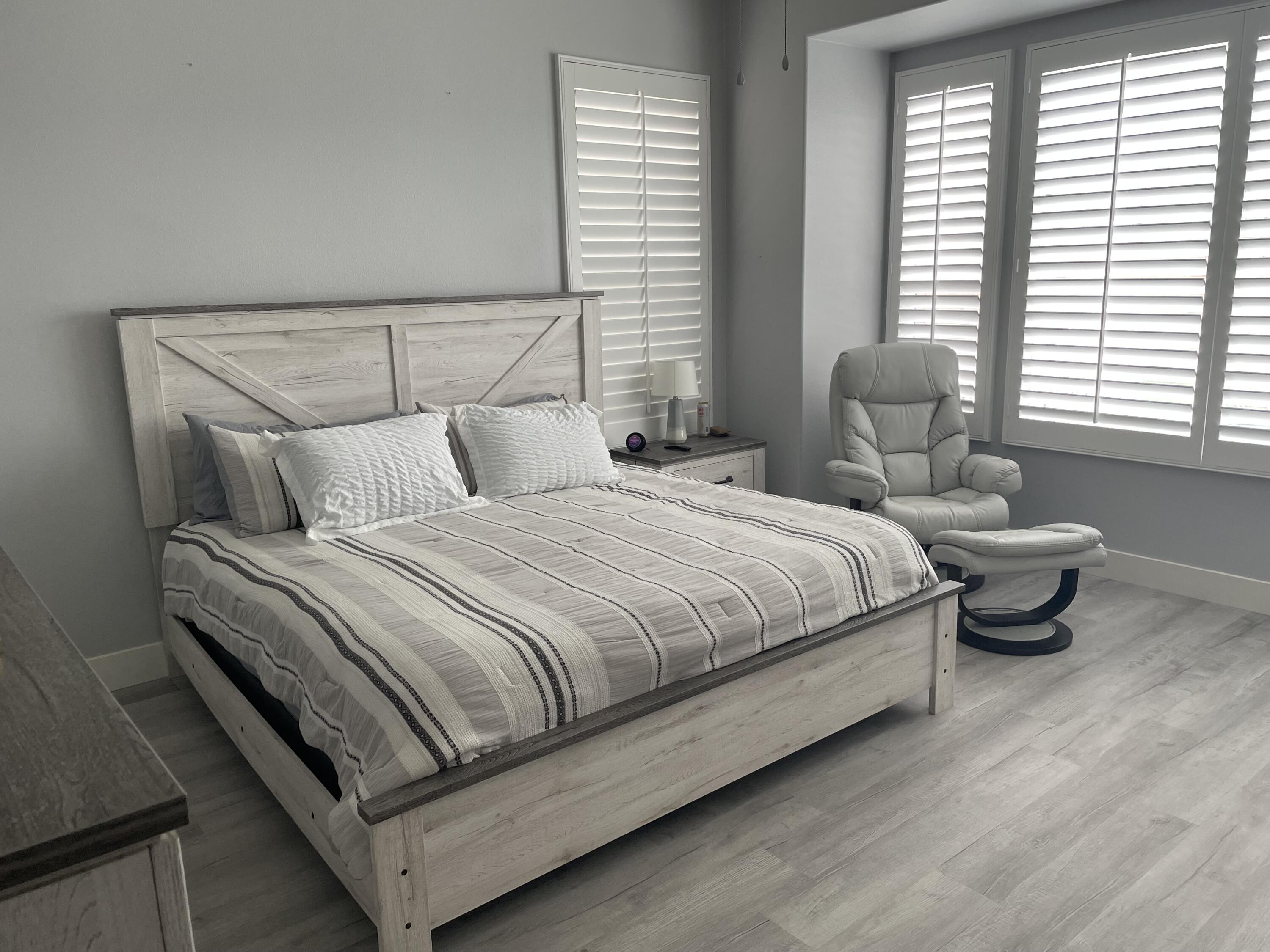 61232 Cactus Spring Drive La Quinta, CA 92253 - Photo 15 of 30 a bedroom with a bed and window