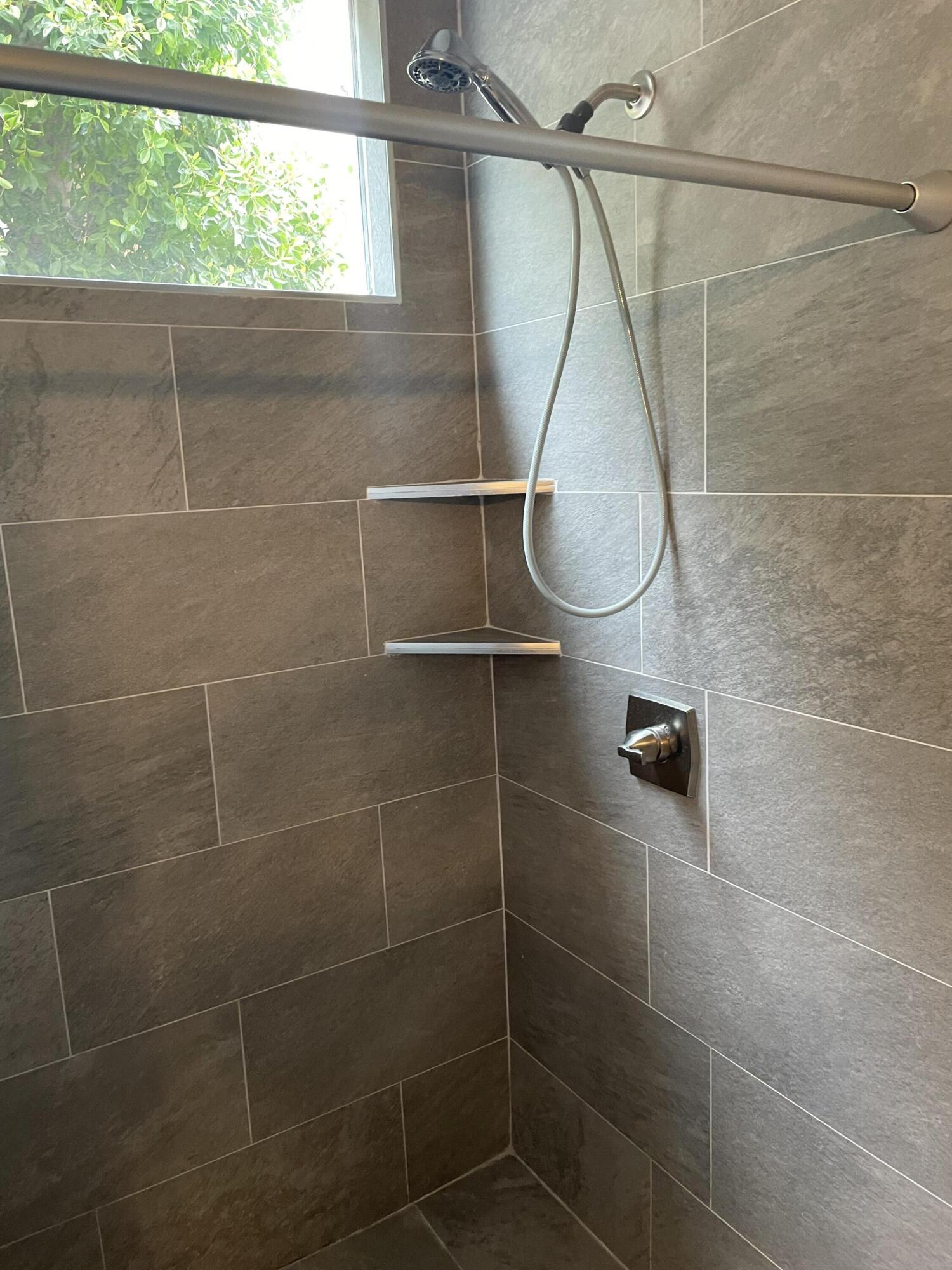 61232 Cactus Spring Drive La Quinta, CA 92253 - Photo 18 of 30 a bathroom with a shower