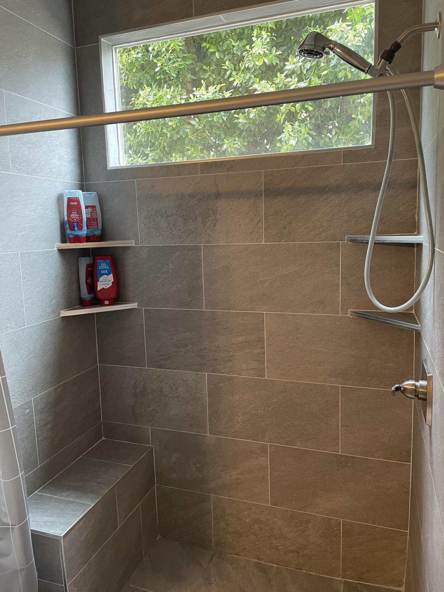 61232 Cactus Spring Drive La Quinta, CA 92253 - Photo 19 of 30 a bathroom with a shower