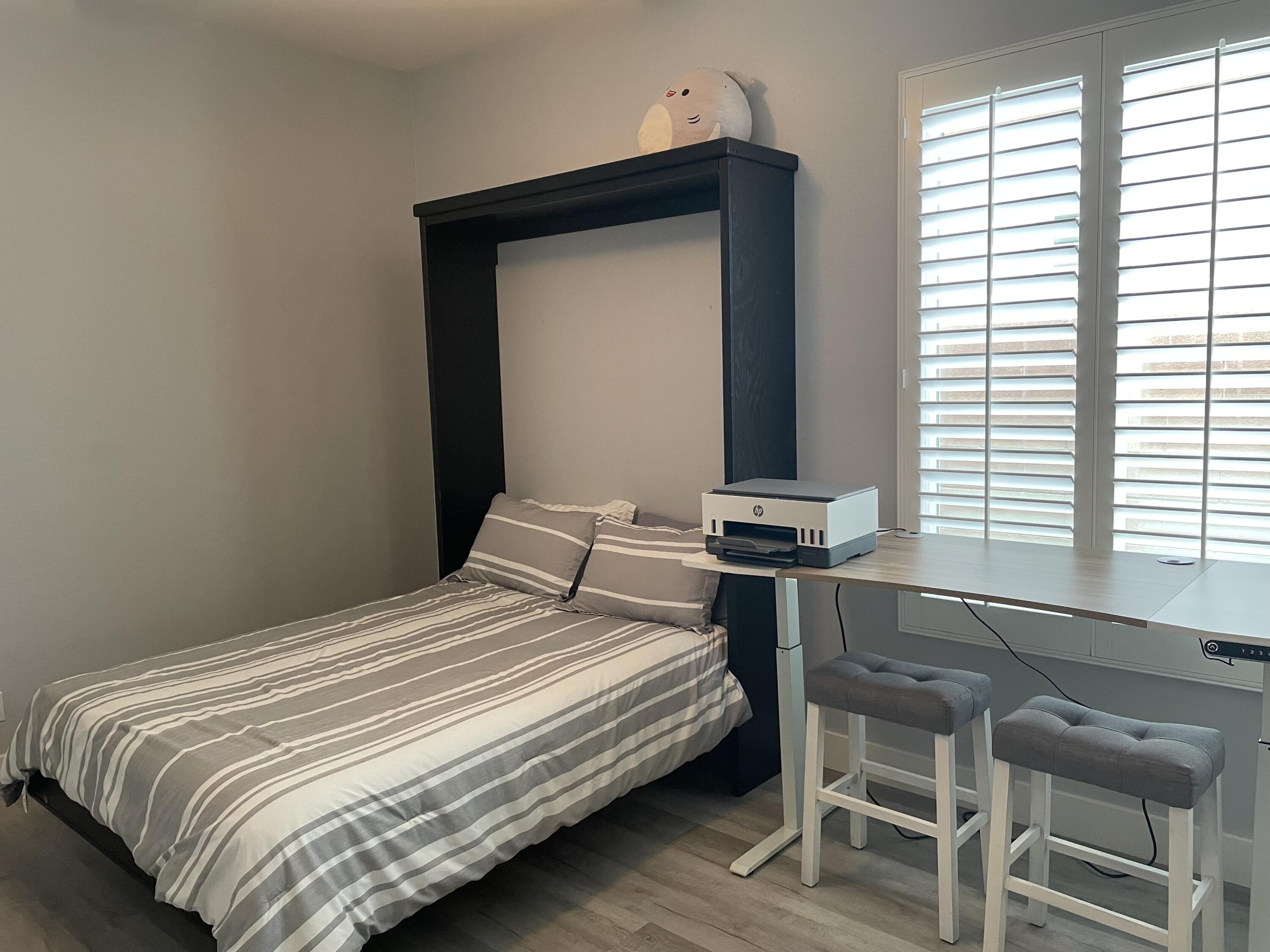 61232 Cactus Spring Drive La Quinta, CA 92253 - Photo 21 of 30 a bedroom with a bed and a window