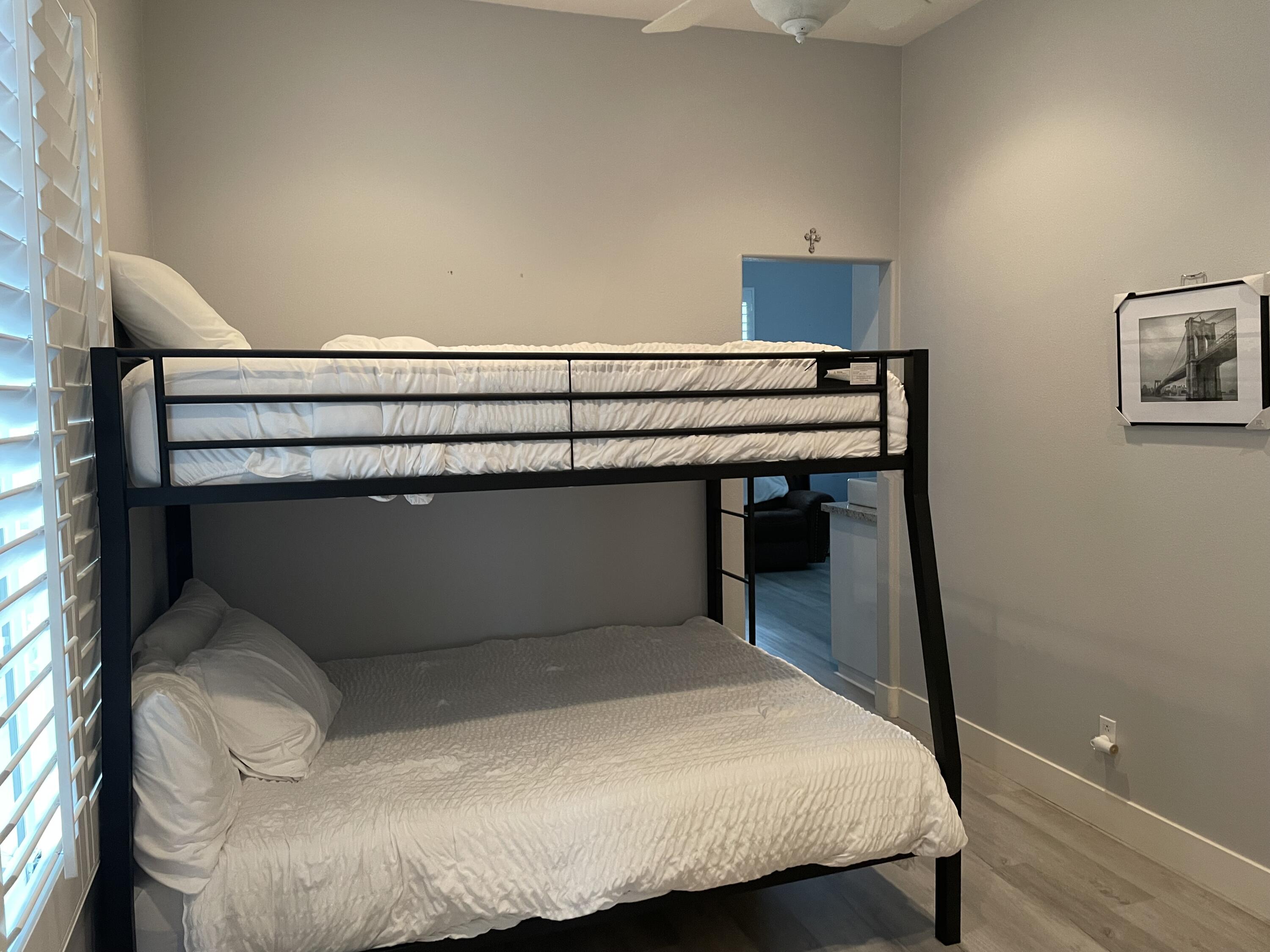 61232 Cactus Spring Drive La Quinta, CA 92253 - Photo 23 of 30 a bedroom with a bed and a desk