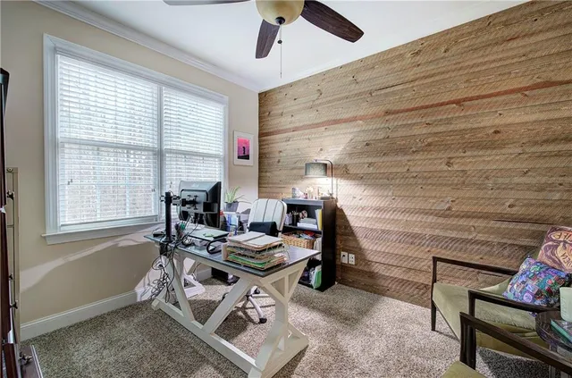 a workspace with furniture and a window