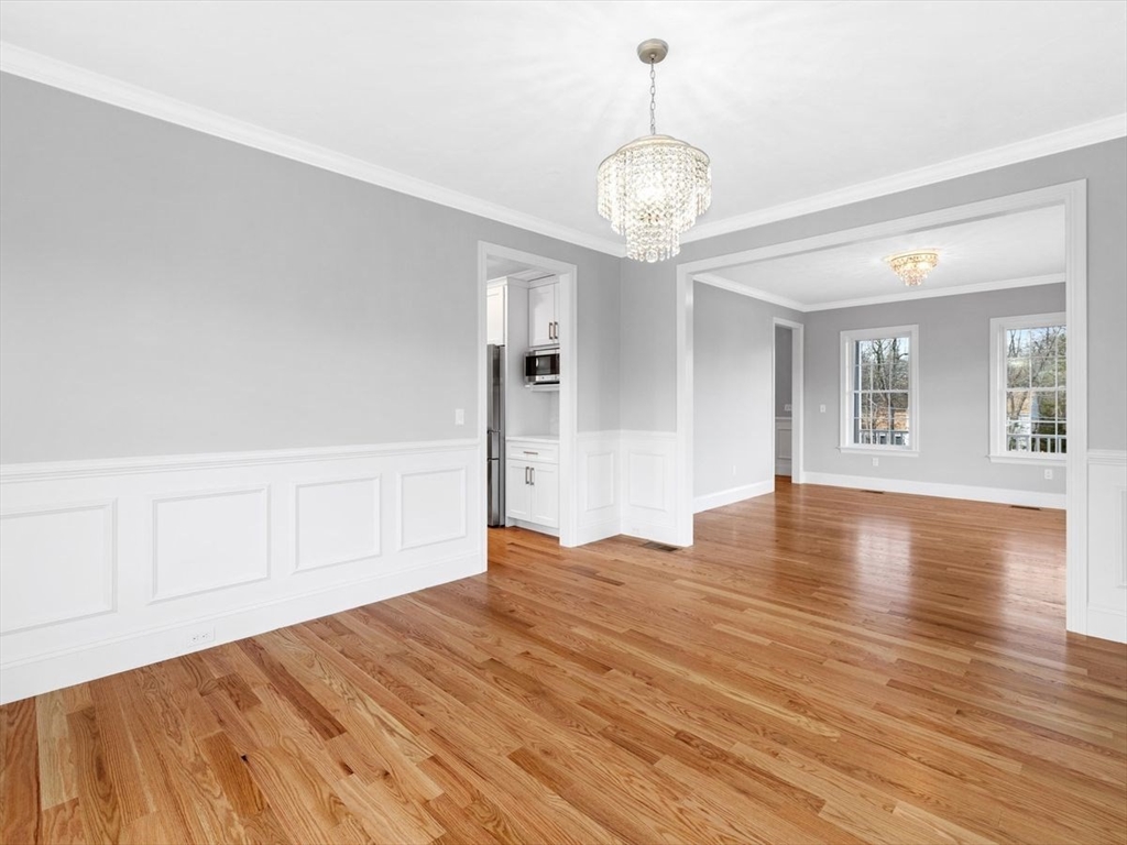 46 Lackey Street Westborough, MA 01581 - Photo 13 of 42 a view of an empty room with wooden floor and a window