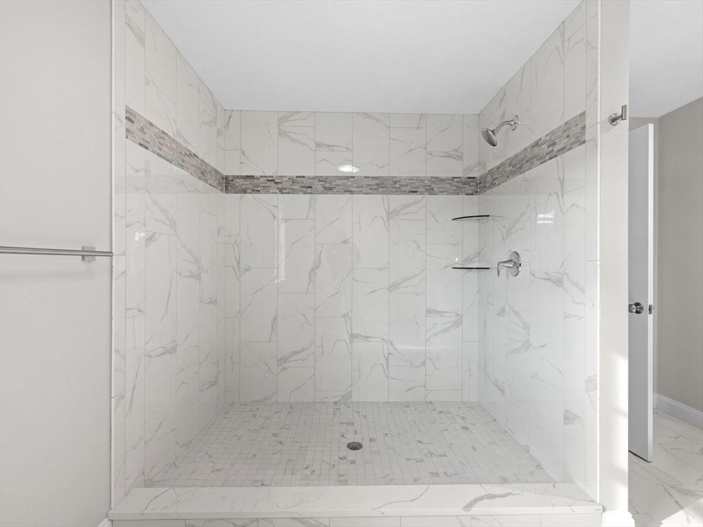 46 Lackey Street Westborough, MA 01581 - Photo 30 of 42 a bathroom with a shower