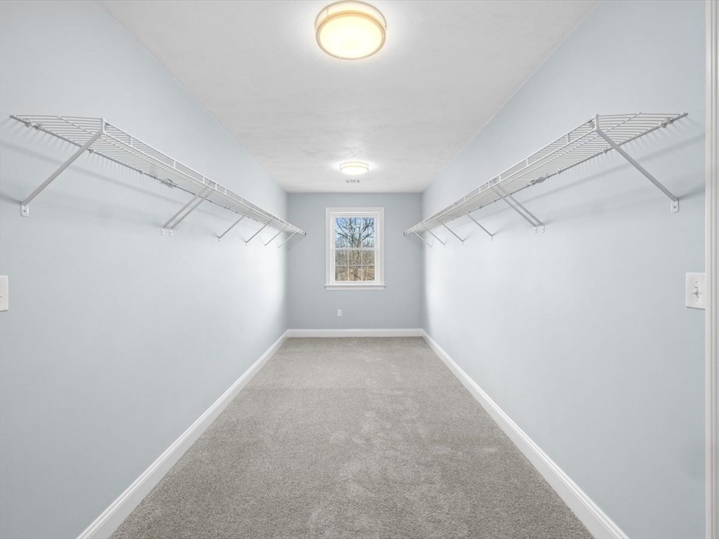 46 Lackey Street Westborough, MA 01581 - Photo 31 of 42 a view of a big room with windows and fireplace