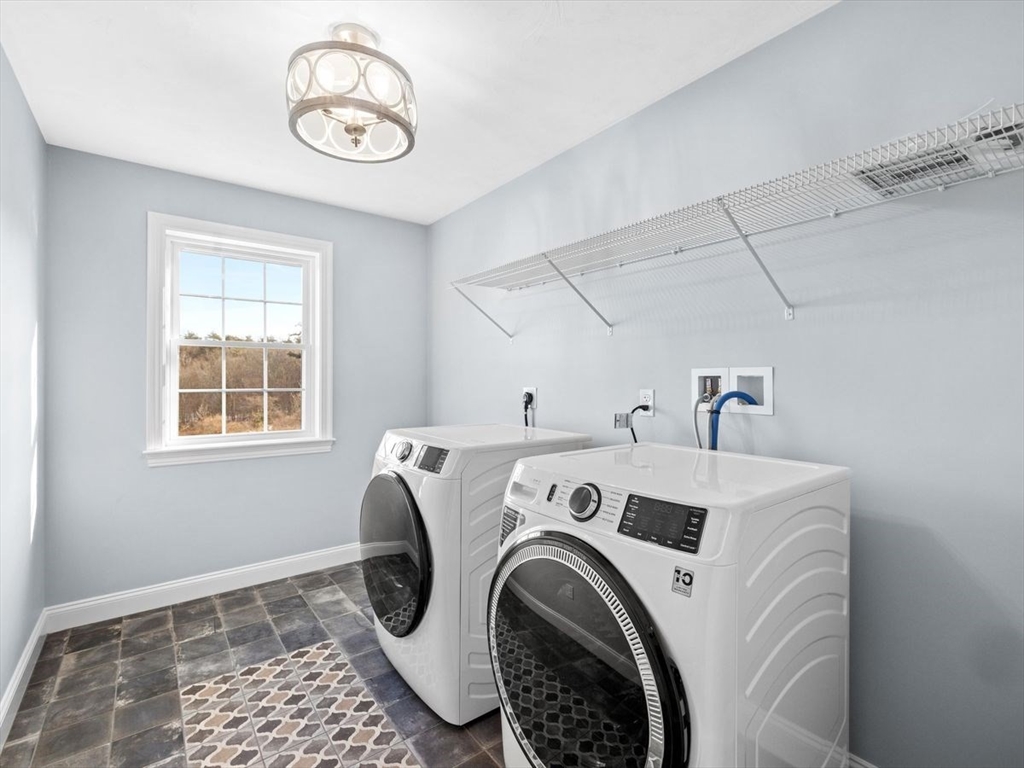 46 Lackey Street Westborough, MA 01581 - Photo 32 of 42 a utility room with dryer and washer