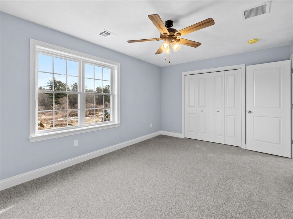 46 Lackey Street Westborough, MA 01581 - Photo 36 of 42 an empty room with windows and fan