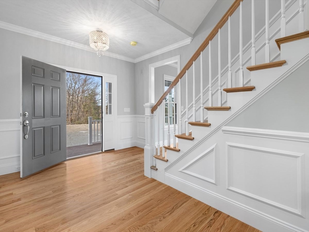 46 Lackey Street Westborough, MA 01581 - Photo 4 of 42 a view of an entryway with wooden floor