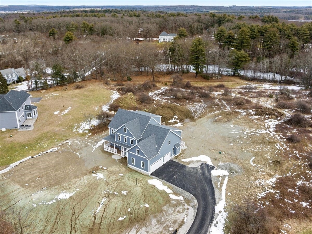 46 Lackey Street Westborough, MA 01581 - Photo 42 of 42 an aerial view of a house with a yard and lake view