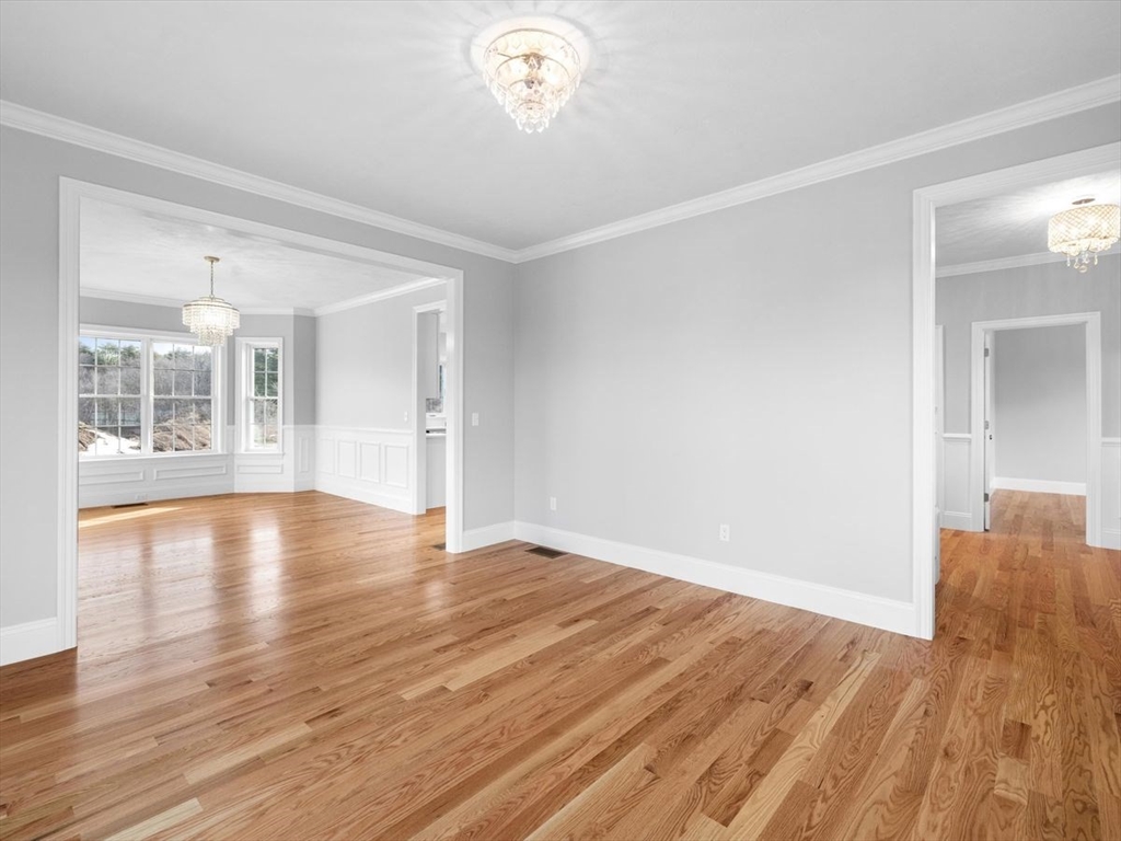 46 Lackey Street Westborough, MA 01581 - Photo 9 of 42 wooden floor in an empty room with a window