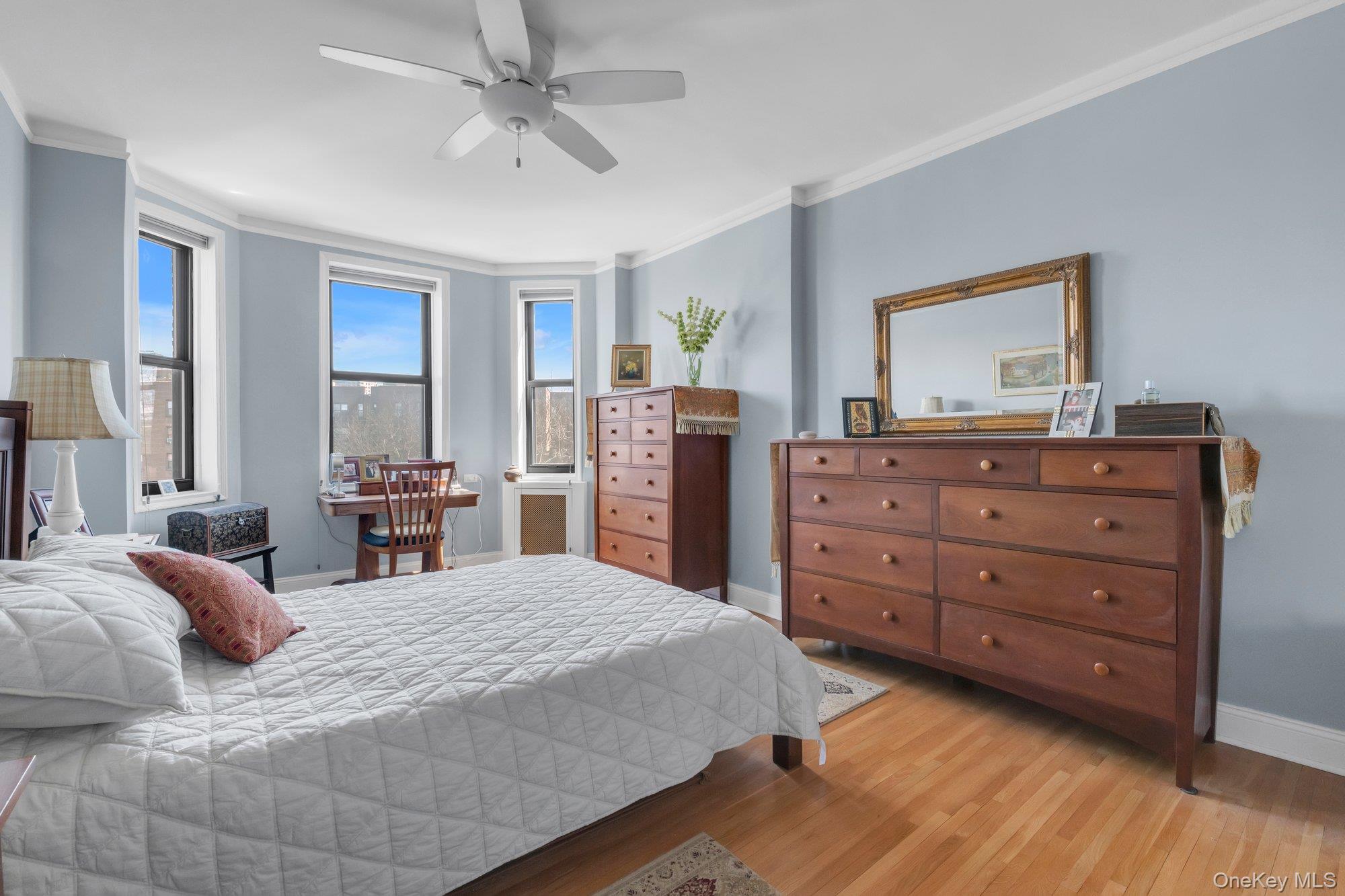 84-51 Beverly Road, Unit 6A Queens, NY 11415 - Photo 11 of 14 a bedroom with a bed and dresser