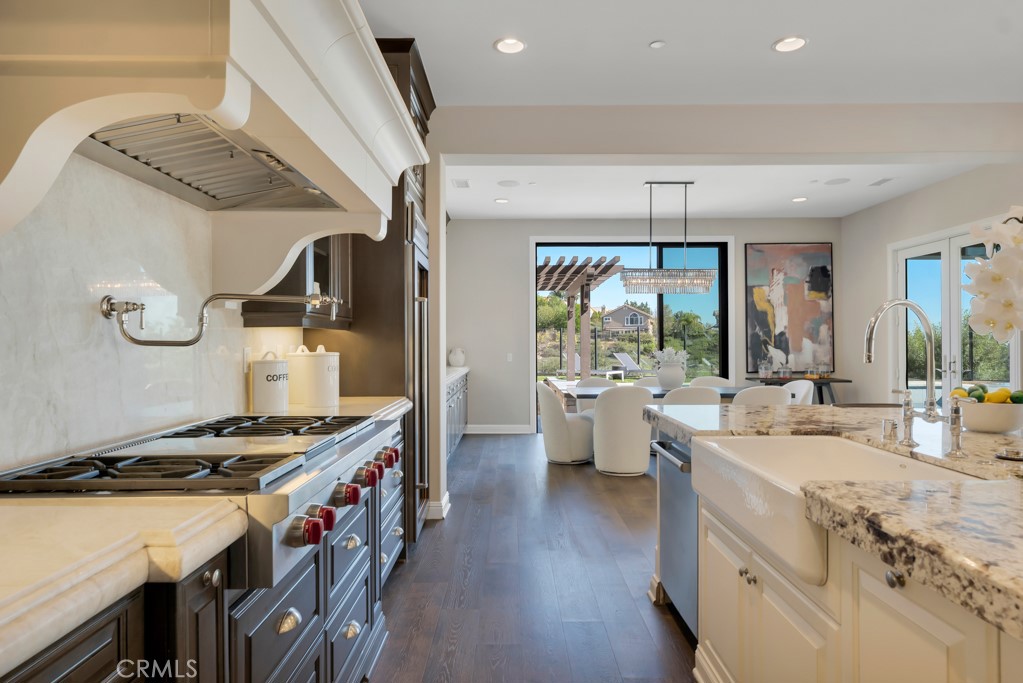 20120 Jubilee Way Porter Ranch, CA 91326 - Photo 18 of 55 a kitchen that has a lot of cabinets in it