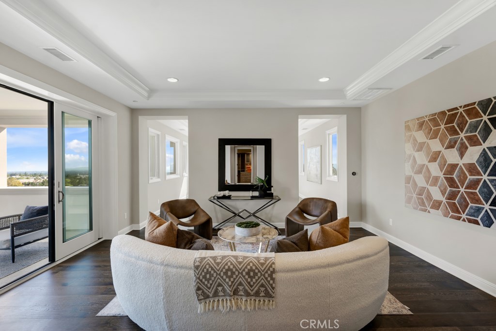 20120 Jubilee Way Porter Ranch, CA 91326 - Photo 27 of 55 a living room with furniture and a window